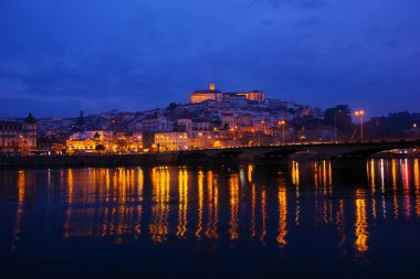 Old town of Coimbra at night, Portugal clipart