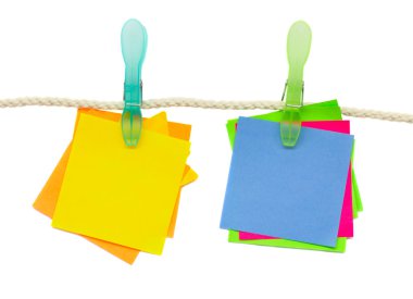 Paper stickers hanging on rope clipart