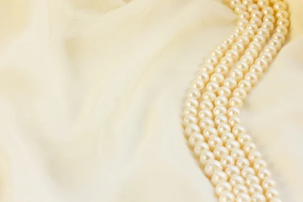 White silk with pearls — Stock Photo, Image