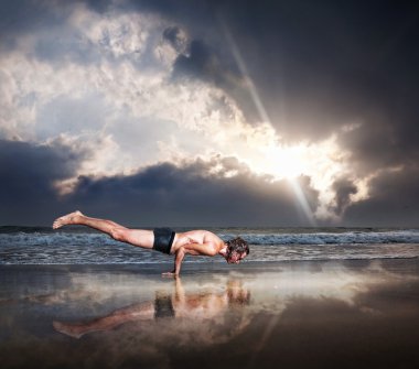 Yoga on the beach clipart