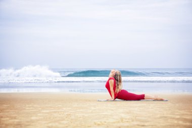 Yoga on the beach clipart