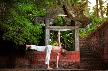 Yoga near temple clipart