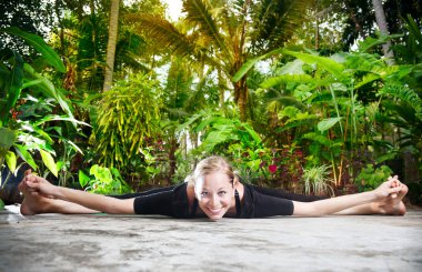 Yoga in the tropic garden clipart