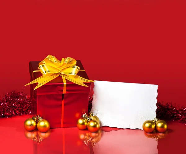 Christmas gift and blank card — Stock Photo, Image