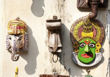 Kathakali and ganesha statues in Kochi clipart
