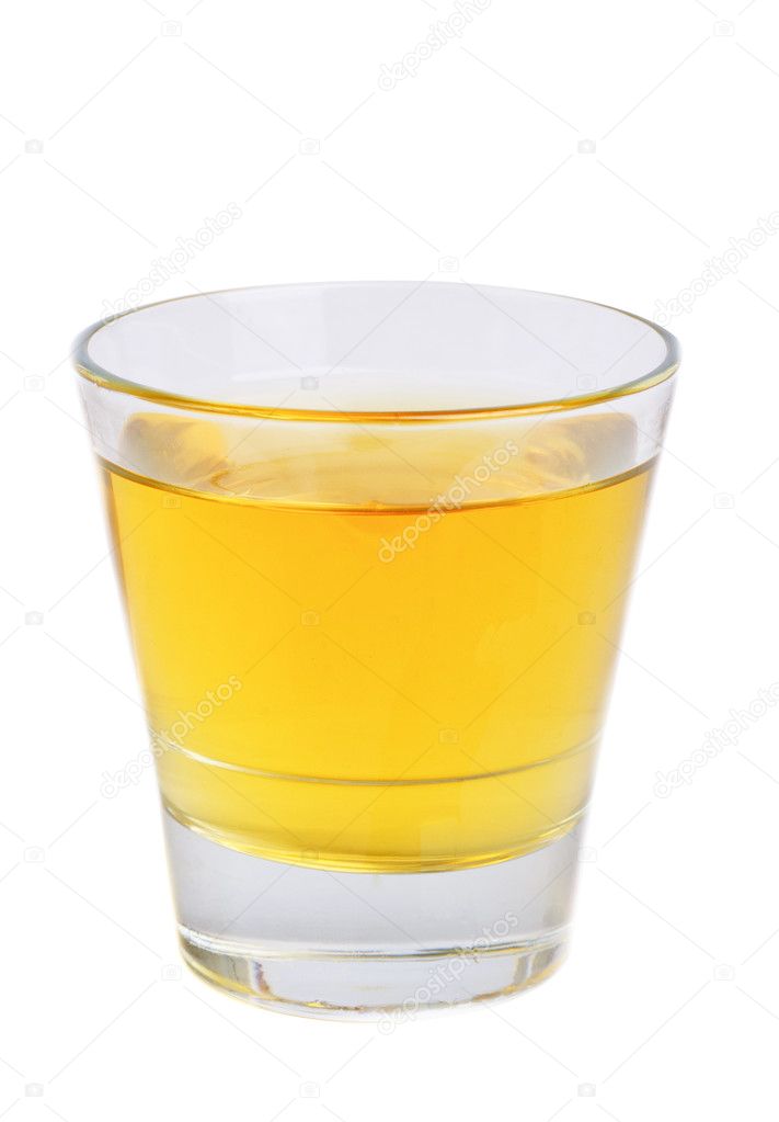 Apple juice in glass isolated on white
