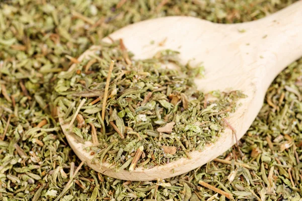 Herb thyme and wooden spoon as background — Stock Photo, Image