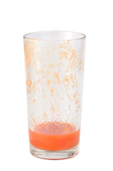 stock image Half full tomato juice glass isolated on white background