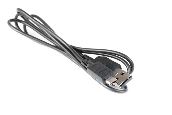 Black computer microusb cables on white background — Stock Photo, Image