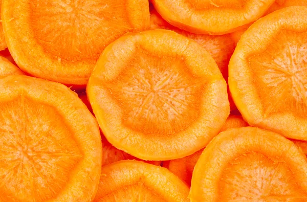 Zanahoria en rodajas como fondo alimentario —  Fotos de Stock