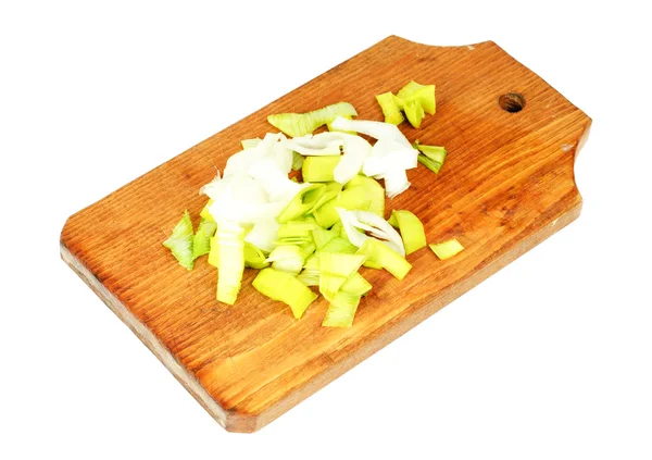 关于切割板隔离在白色背景上的新鲜韭菜 — 图库照片