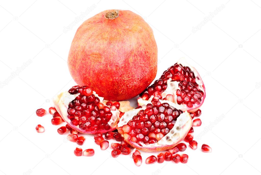 Pomegranate and slice isolated on white background
