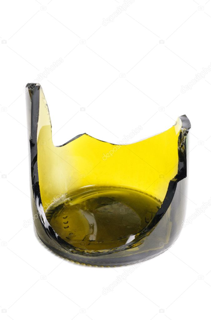 Shattered green wine bottle isolated on the white background