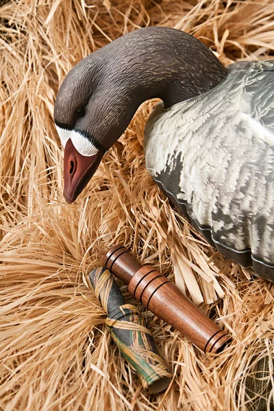 Goose decoy with stuffed and calls — Stock fotografie