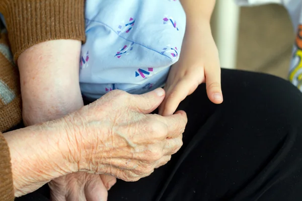 stock image Old and young hand