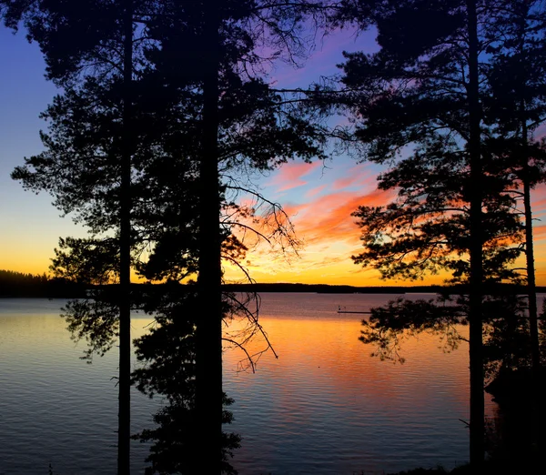 Solnedgång vid saima sjö — Stockfoto