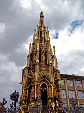 Famous Fountain Schoener Brunnen in Nuremberg clipart