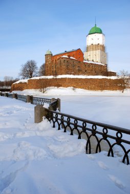 Vyborg castle in winter. Russia clipart