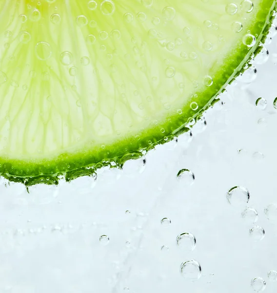 Lime and bubbles — Stock Photo, Image