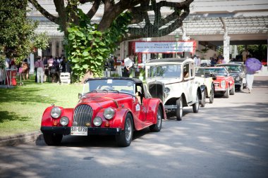 Cars row on Vintage Car Parade clipart