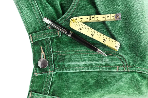 Jeans and measuring tape — Stock Photo, Image