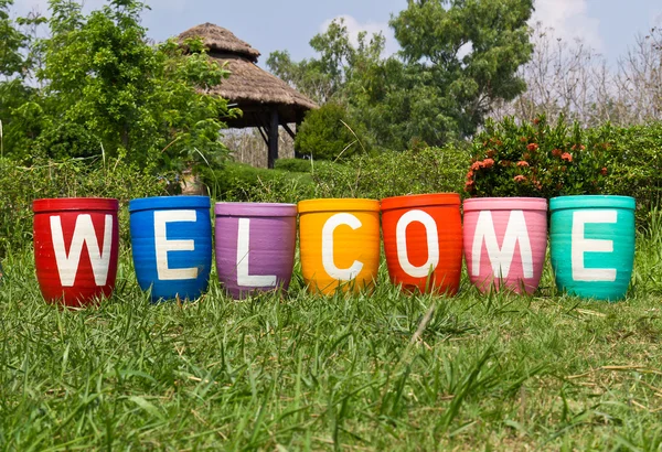 Stock image Clay pots with welcome message