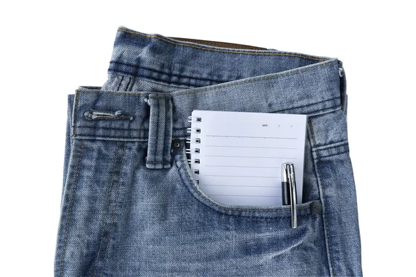 Nové modré džíny kalhoty a Poznámkový blok — Stock fotografie
