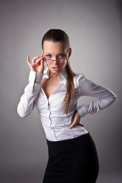 Sexy business woman take glasses off — Stock Photo, Image