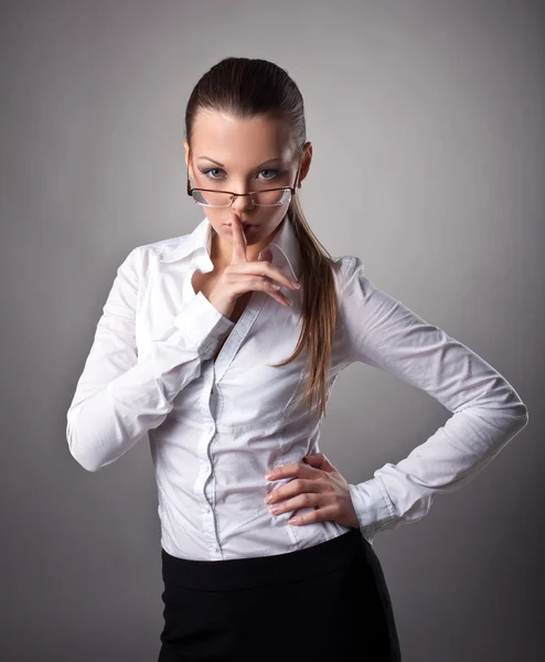 Sexy business woman silence sign — Stock Photo, Image