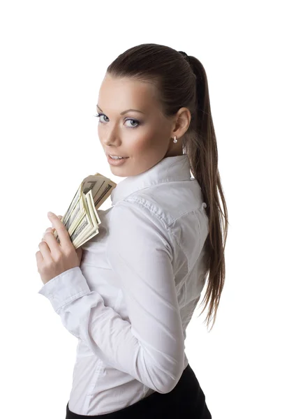 Молодая сексуальная деловая женщина берет пачку долларов — стоковое фото