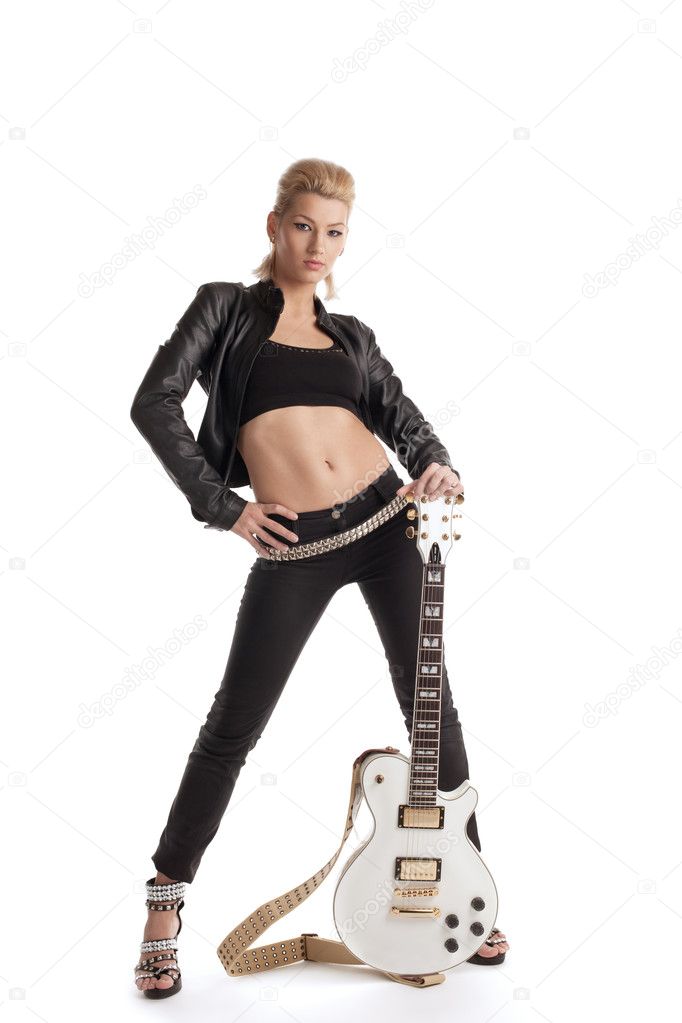 Rock woman in black leather posing with guitar