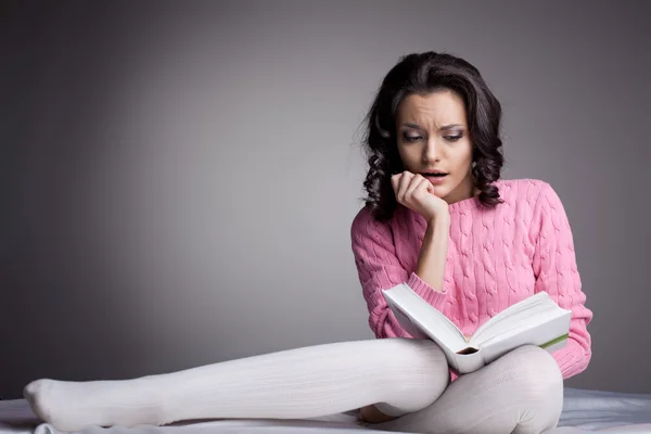 stock image Beauty woman in dark read scare book