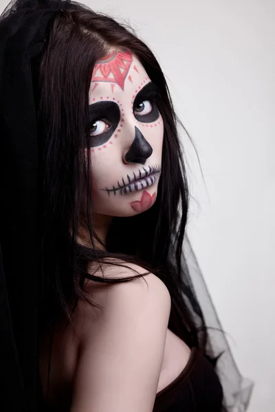 Depressed woman skull face art look at camera — Stock Photo, Image