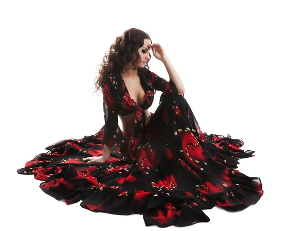 Молода жінка позує в костюмі фламенко ізольована — стокове фото