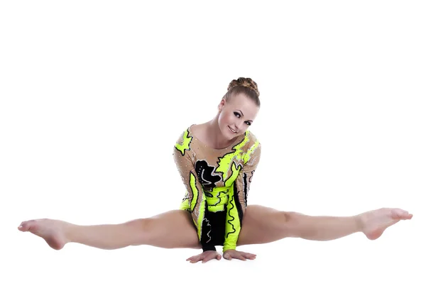 Mladí profesionální gymnastkou dělá rozdělení izolované — Stock fotografie