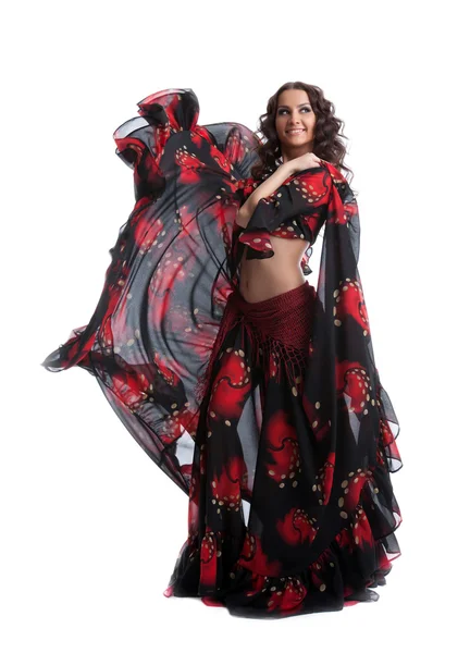 Mulher dança em vermelho cigano e traje preto — Fotografia de Stock