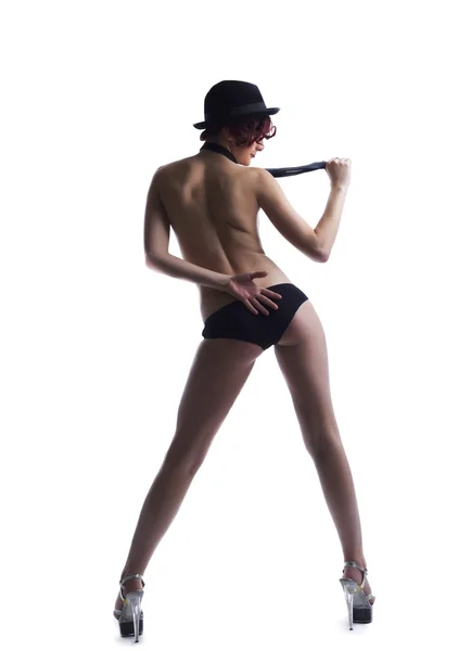 Сексуальная красная обнаженная женщина танцует в шляпе — стоковое фото