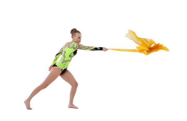 Young beauty gymnast fight with flying fabric — Stock Photo, Image