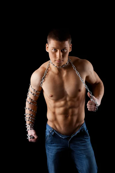 Yong aggressive man with chain on hands — Stock Photo, Image