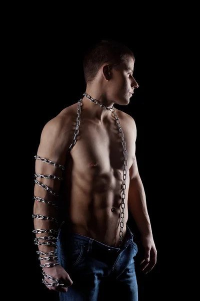 Yong beauty naked man with chain on hand — Stock Photo, Image