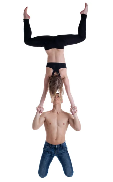 Par gymnast visar stå å Stockfoto