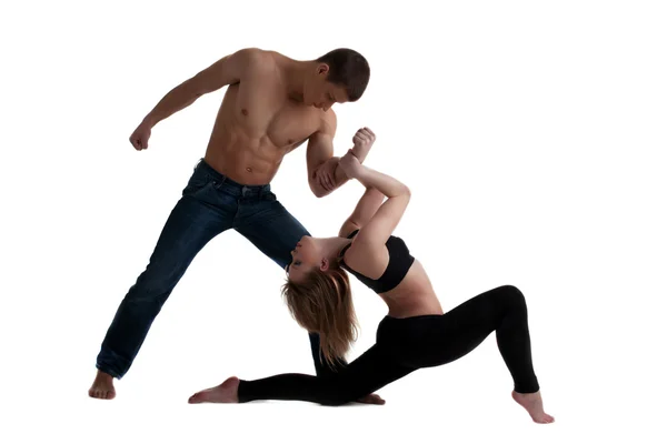 Dva mladí akrobaté pózuje v tanci Royalty Free Stock Fotografie