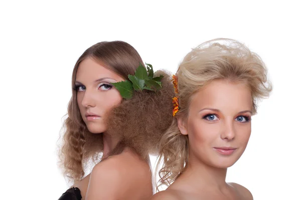 Two young woman with flower hair style — Stock Photo, Image