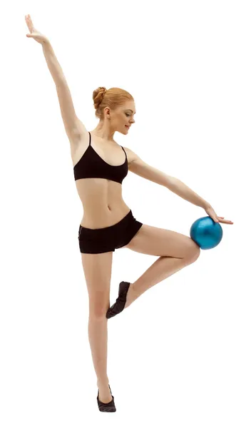 Beauty woman dance with ball in black isolated — Stock Photo, Image