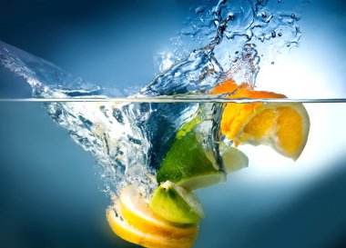 Citrus fall into the water clipart