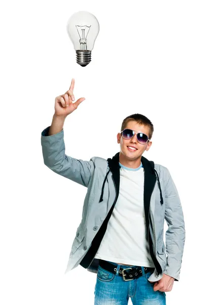 Podobizna mladého muže s žárovka — Stock fotografie