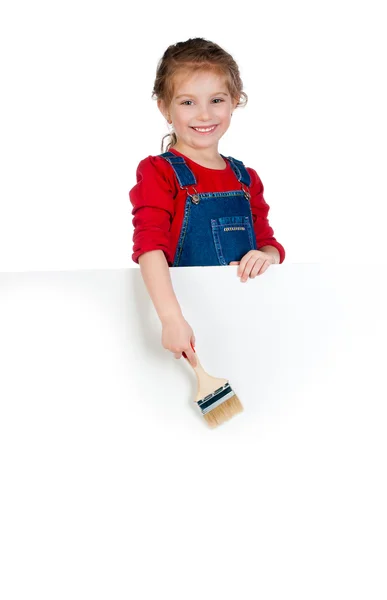Kleines Mädchen mit Pinsel und weißem Banner — Stockfoto
