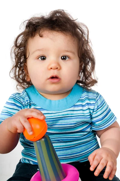 Малыш с игрушкой — стоковое фото