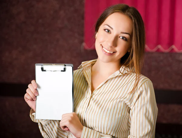 Young woman with paper for your text or image — Stock Photo, Image