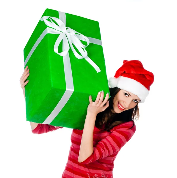 Girl in Santa hat with gifts — Stock Photo, Image